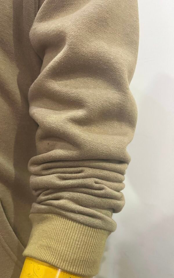 Close-up of sleeve detail on Wearees khaki cotton fleece hoodie.
