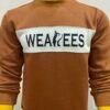 Burnt orange cotton fleece sweatshirt with Wearees logo, front view on mannequin