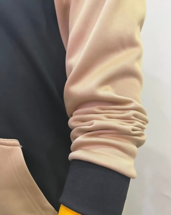 Side arm detail of Wearees black polyester hoodie with stylish Palestine design - quality craftsmanship